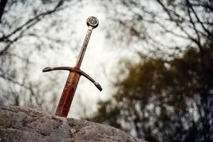 معمای شمشیر فرورفته در درخت